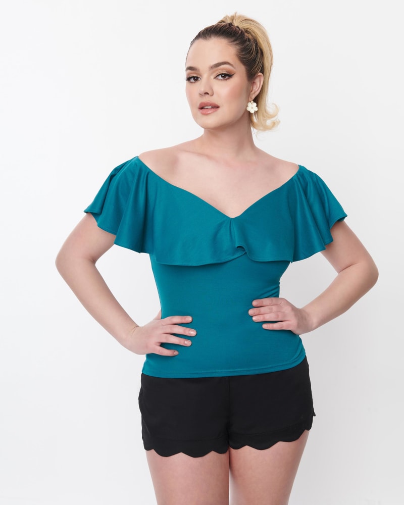 Front of a model wearing a size 4X Unique Vintage Teal Ruffle Frenchie Knit Top in Blue by Unique Vintage. | dia_product_style_image_id:301112